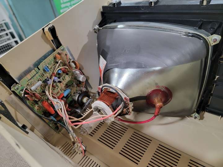The vacuum seal on the CRT broke when the mounts failed and the tube fell backward into the case