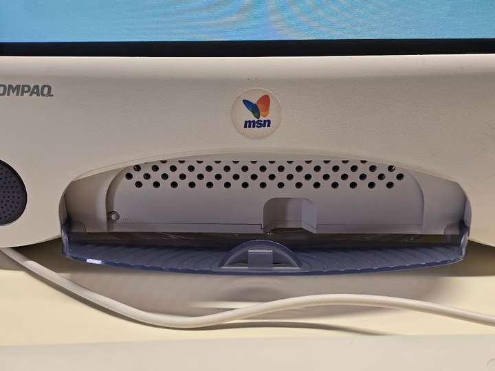 Fold-down door with reset button